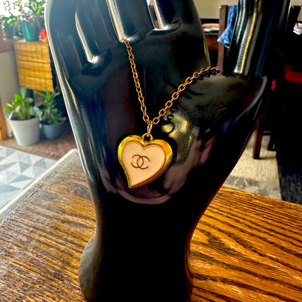 Luxury up-cycled bag charm with gold chain in excellent condition.
